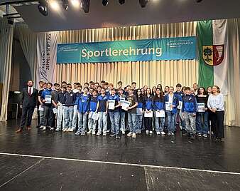 Ein Gruppenfoto auf der Bühne