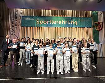 Ein Gruppenbild auf der Bühne