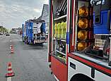 Das Löschfahrzeug und der Müllwagen in der Ailinger Straße