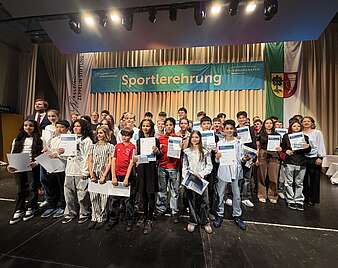 Ein Gruppenbild auf der Bühne